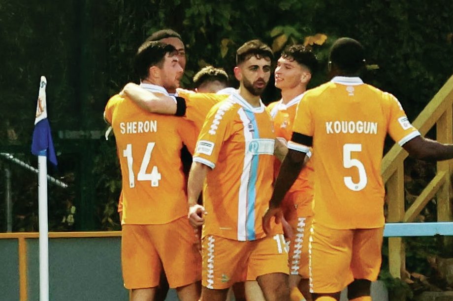 Goalscorer Adam Campbell is swamped by his Hartlepool team mates