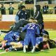 Connor Kirby celebrates scoring Buxton’s late winner against Chatham and is mobbed by team mates