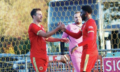 Joe Healy, left, takes the plaudits after his opener for Whitstable