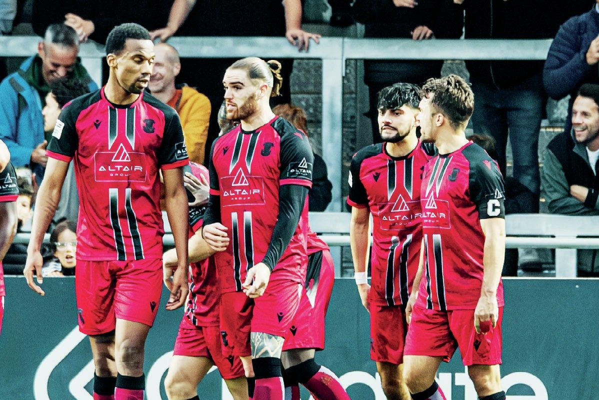 Tamworth celebrate Ben Milnes’ penalty