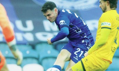 Conor McBride gets a shot off for Rochdale