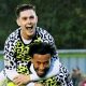 Nick Haughton hitches a ride on Forest Green Rovers midfielder Jayden Clarke after he made it 3-0
