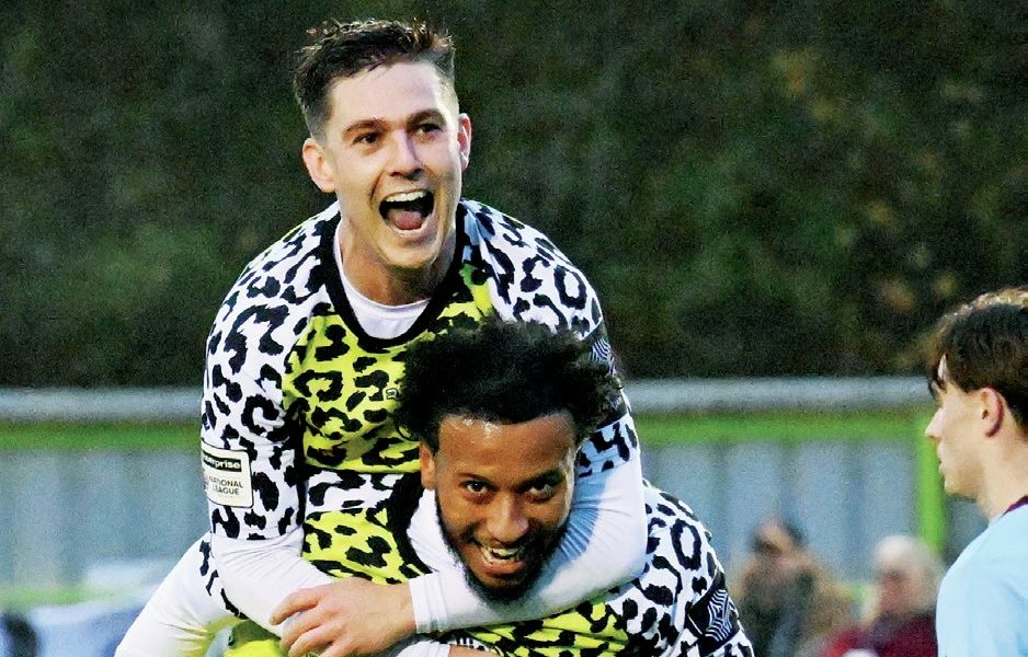 Nick Haughton hitches a ride on Forest Green Rovers midfielder Jayden Clarke after he made it 3-0