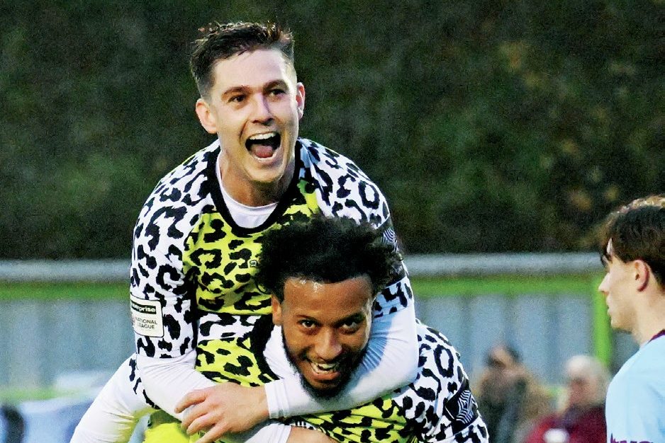 Nick Haughton hitches a ride on Forest Green Rovers midfielder Jayden Clarke after he made it 3-0