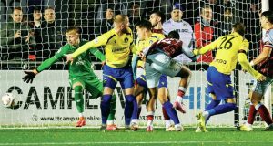 Solihull Moors’ Tyler French heads home the final goal of the game to make it 3-0