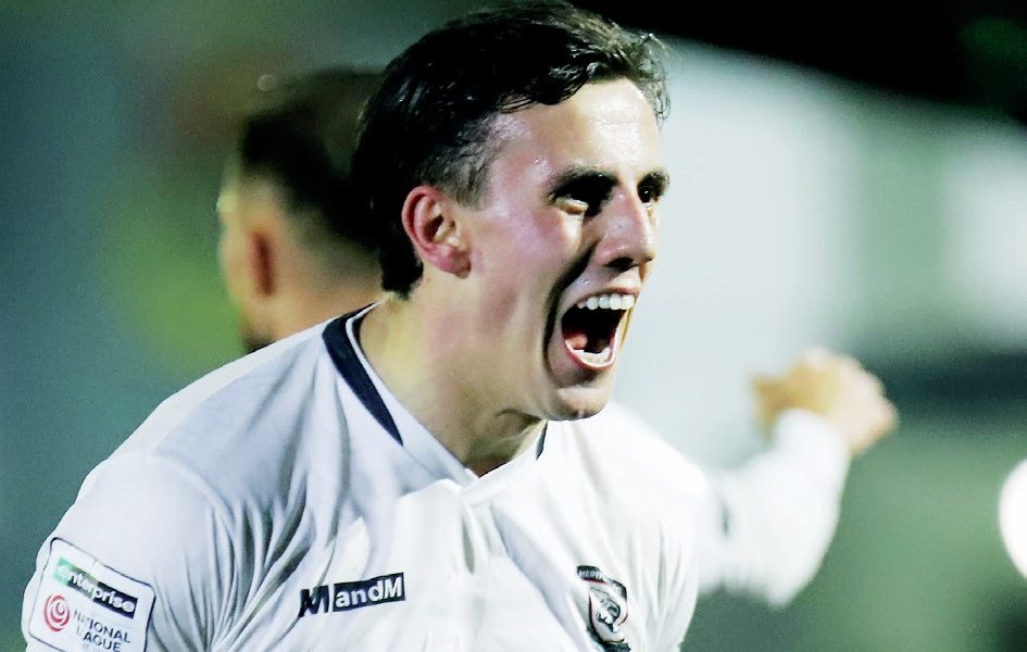 Sam Osborne celebrates after netting his third