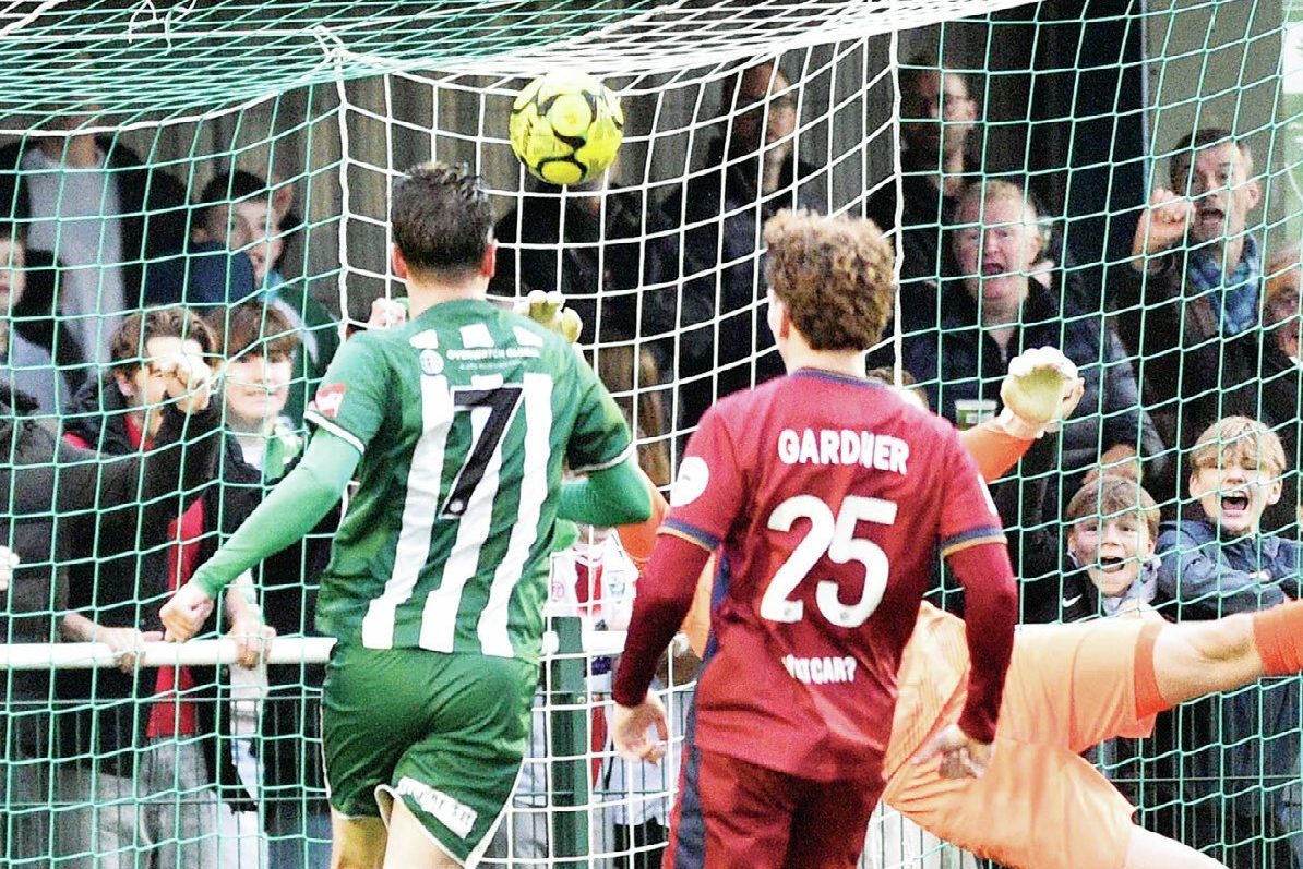 Jordan Gallagher heads past Hampton goalkeeper Matt Rowley for his side’s second goal