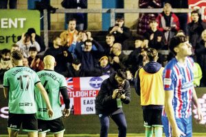 Eastleigh applaud their fans as Carlisle trudge off the pitch