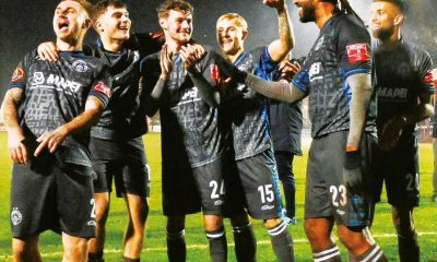 Halesowen Town players celebrate with supporters