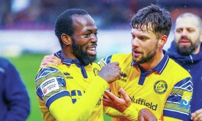 Woking’s Josh Osude, left, and Jack Turner celebrate victory