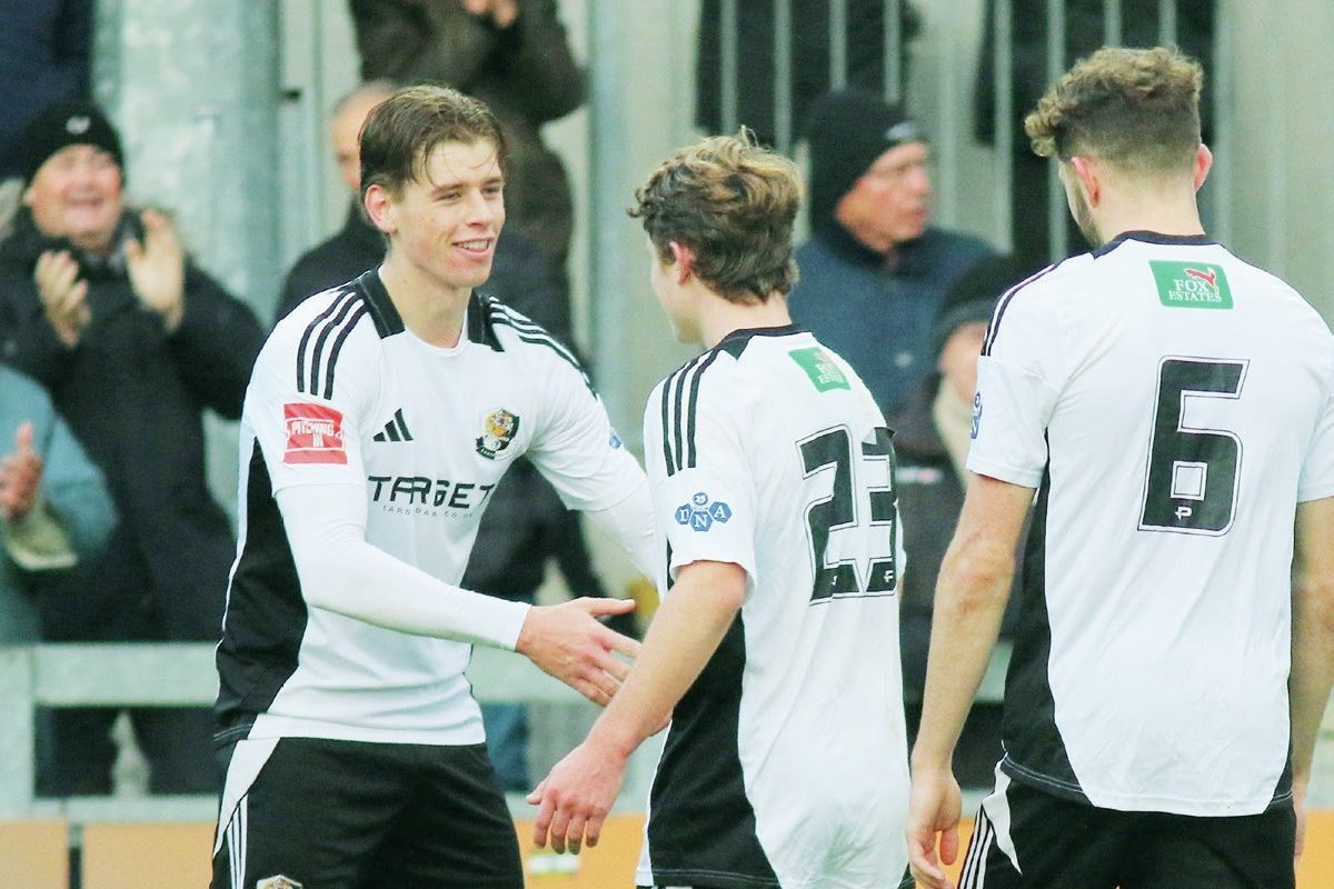 Sam Smith (far left) is congratulated by his team-mates for his goal