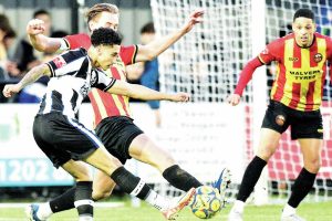 Owen Prince fires a shot goalwards for Wimborne
