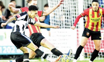 Owen Prince fires a shot goalwards for Wimborne