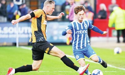 Chester’s Iwan Murray takes on Cambridge United’s Michael Morrison in their FA Cup tie