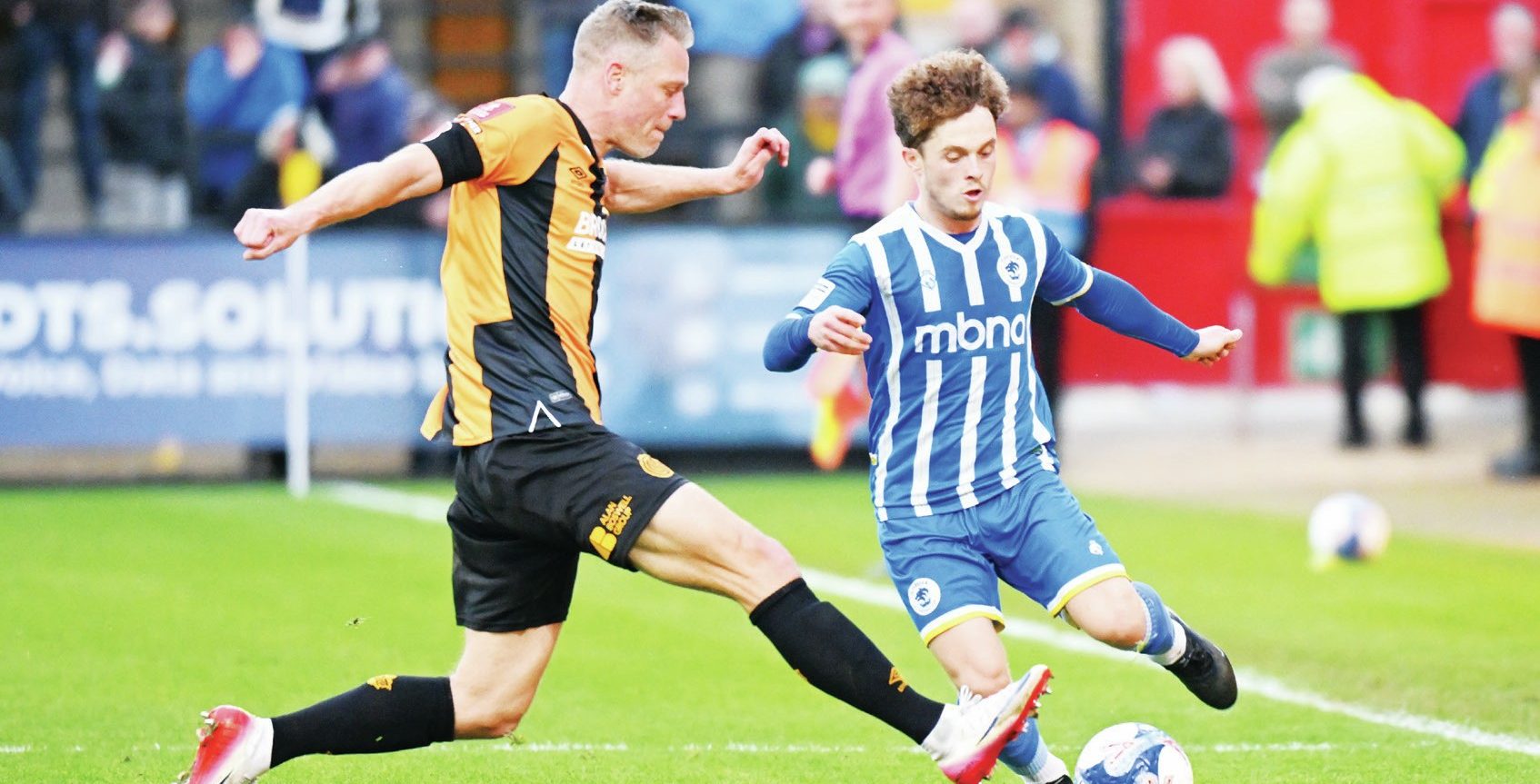 Chester’s Iwan Murray takes on Cambridge United’s Michael Morrison in their FA Cup tie