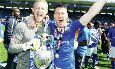 Leicester’s David Nugent and Kasper Schmeichel celebrate the Championship title in 2014