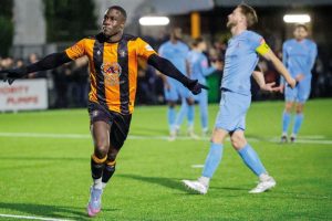 Folkestone substitute Ade Yusuff celebrates scoring from the spot