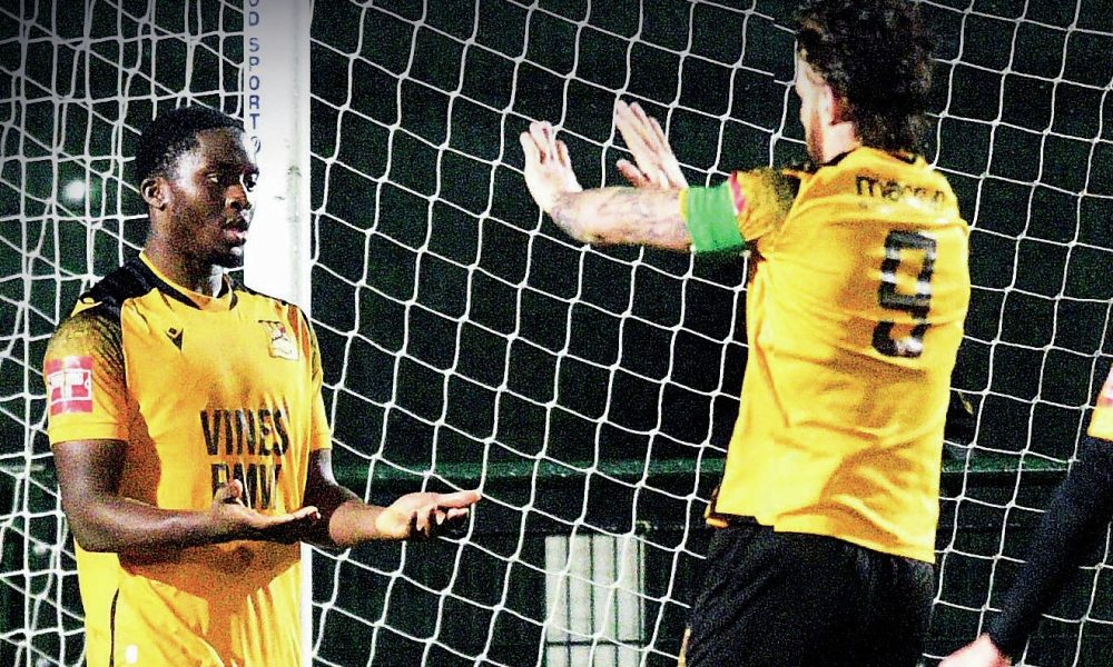 Ade Adeyinka celebrates scoring his second goal for Three Bridges