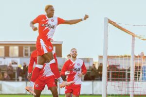 Samuel Ayo Faniyan celebrates scoring Poole Town’s first goal