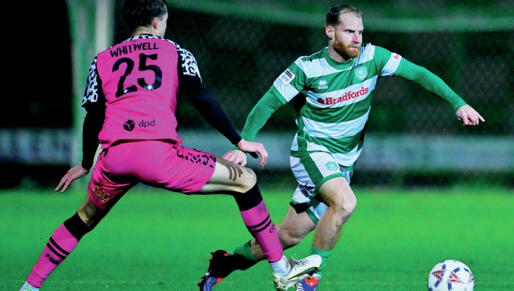 Yeovil Town’s Josh Sims takes on Forest Green Rovers’ Harry Whitwell