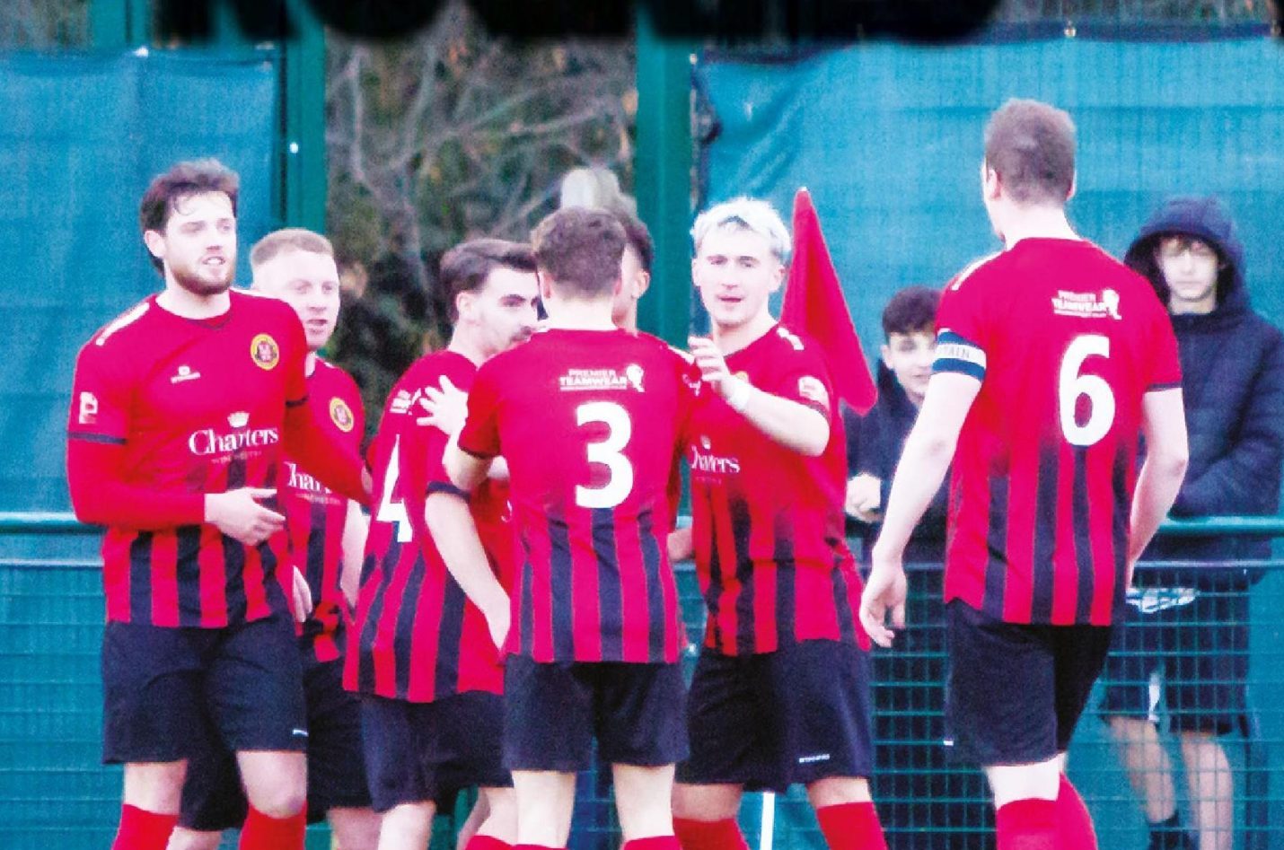 Winchester City celebrate taking the lead through Jahiem Dotse