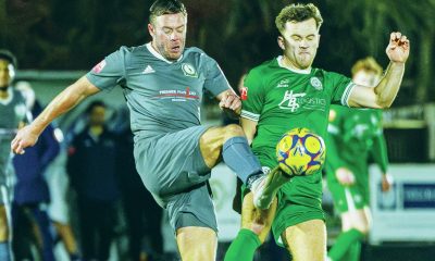 Biggleswade FC's Conner Inskip, right, challenges for the ball