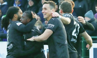 Abdul Abdulmalik, second left, is congratulated for putting Boreham Wood in front