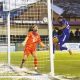 Adriel Walker nods in a late equaliser for Buxton