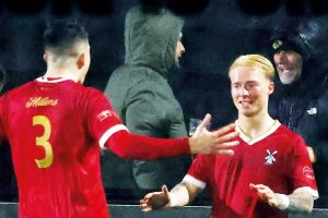 Fletcher Hubbard is congratulated after opening the scoring for Aveley