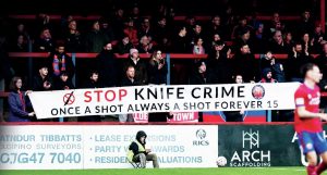 The banner unfurled by Aldershot Town fans