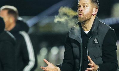 Luke Garrard led Boreham Wood to victory over title chasers York City on Tuesday night.