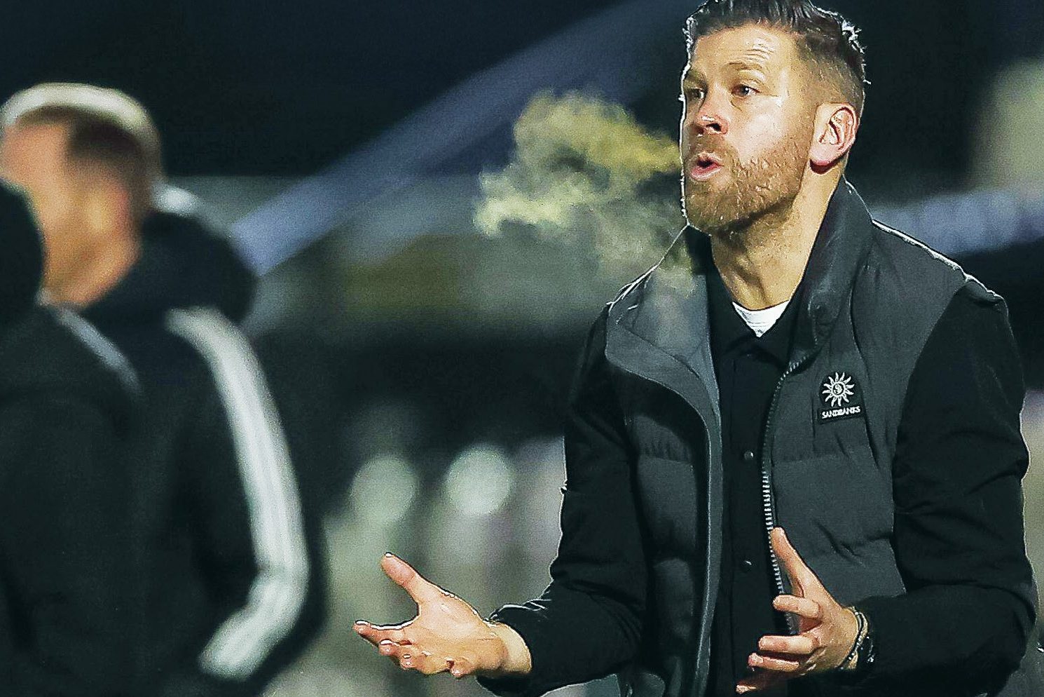 Luke Garrard led Boreham Wood to victory over title chasers York City on Tuesday night.