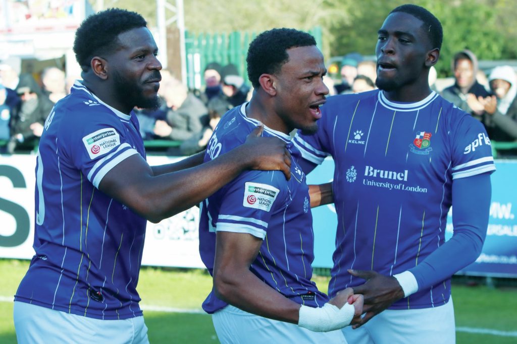 Micah Obiero celebrates his superb late winner for Wealdstone against Marine