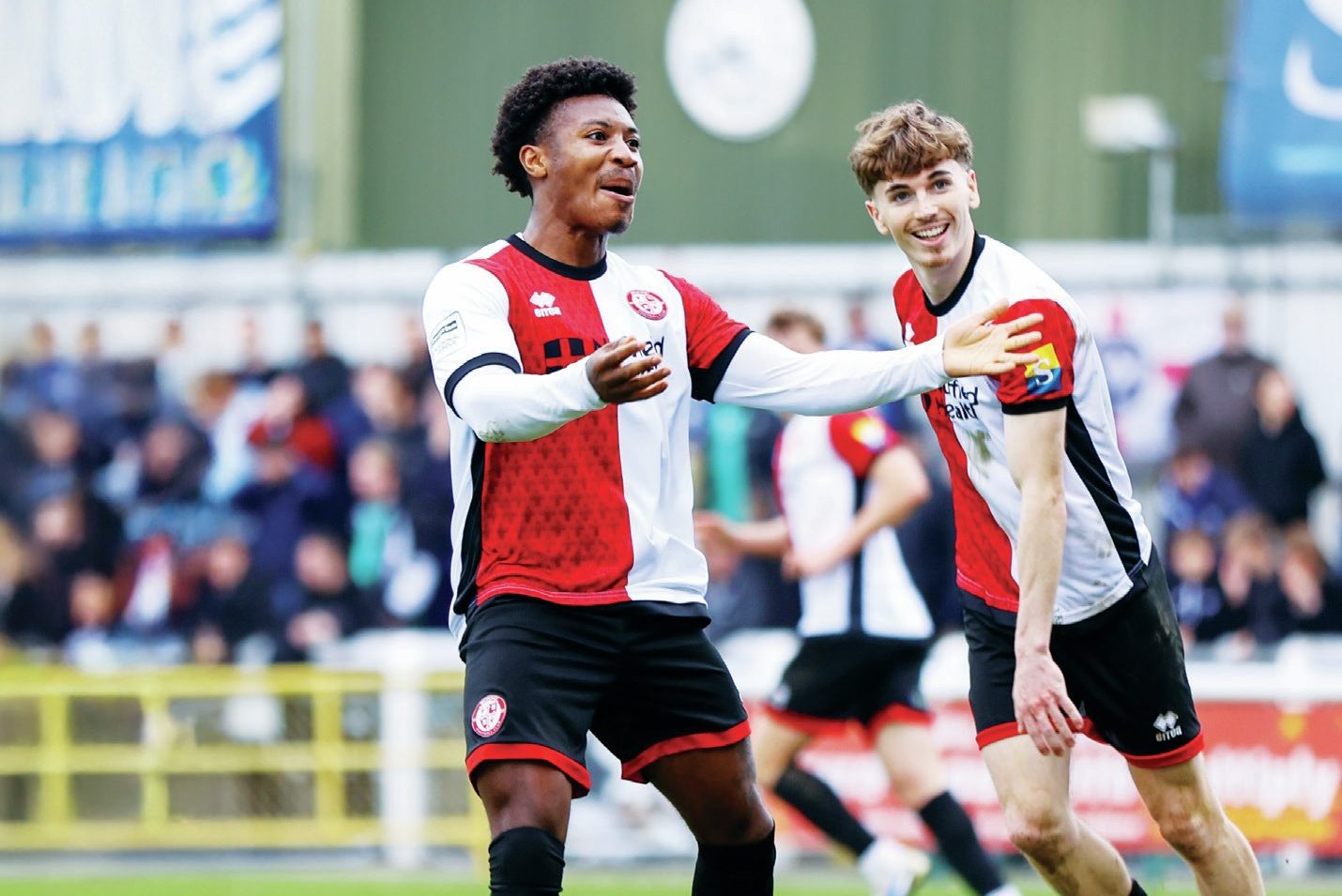Kian Pennant, left, and Matt Ward celebrate Woking’s equalising goal